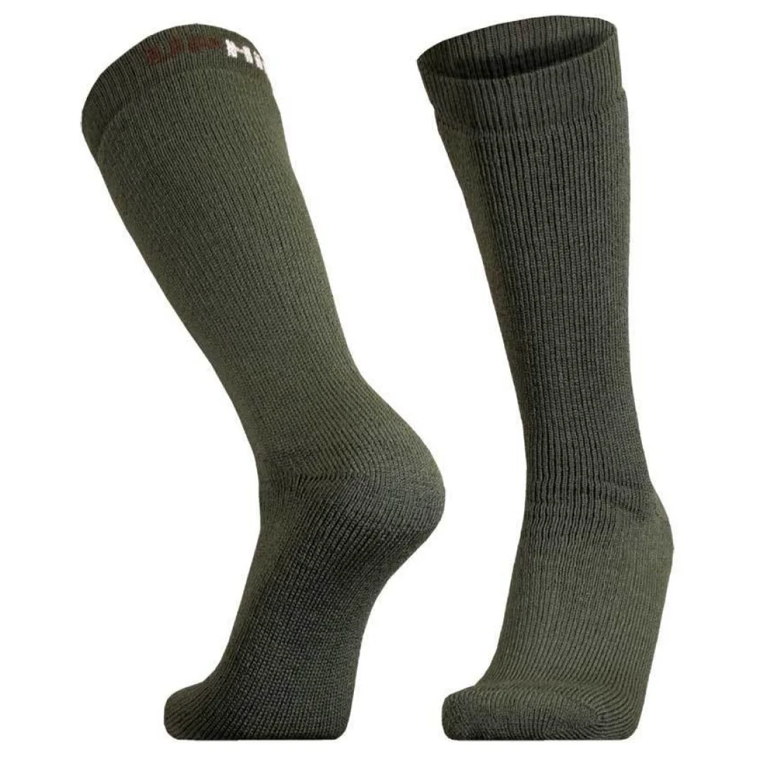Groene thermokniekousen met wit Inari-logo op de bovenboord