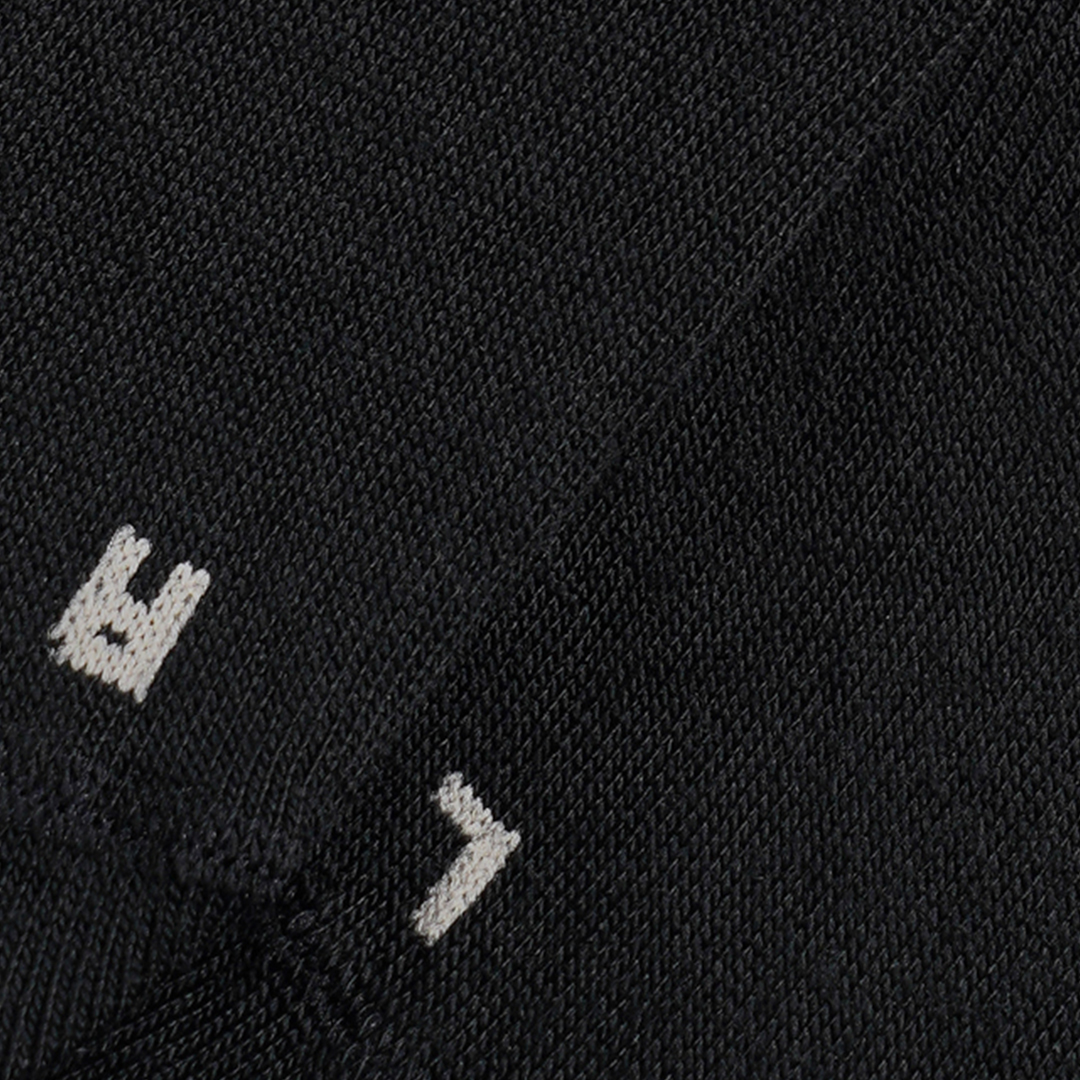 Zwarte voetie met klein wit logo op de wreef, Invisible Footies S19